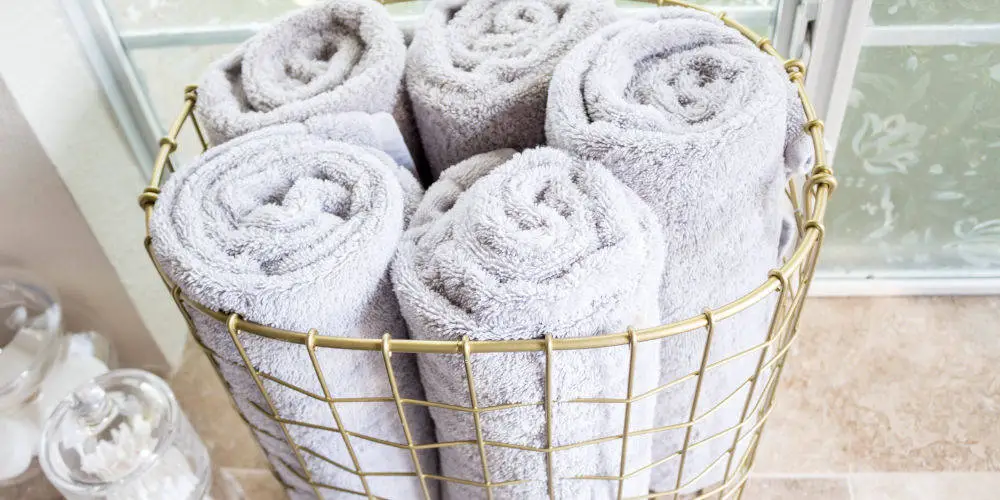 roll towels for more bathroom storage