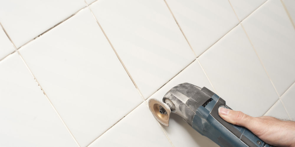 Removing grout between wall tiles
